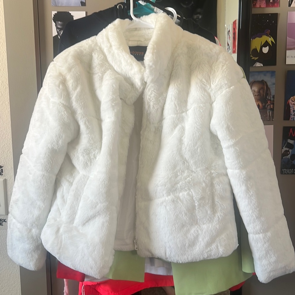 furry white coat